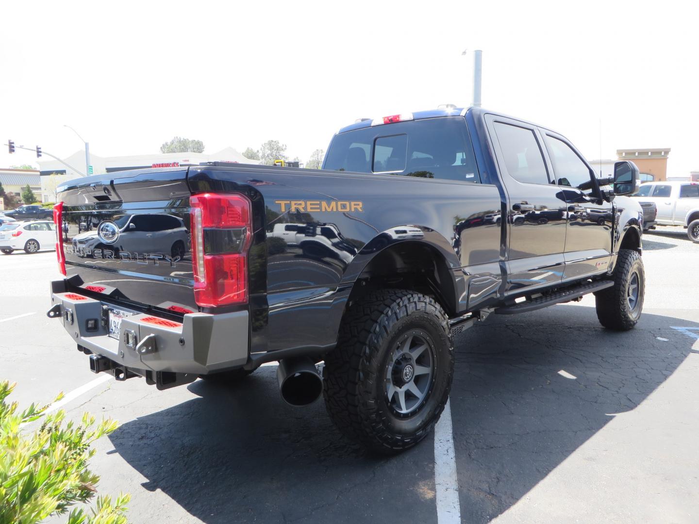 2023 BLUE /BLACK Ford F-350 SD Lariat Crew Cab Long Bed 4WD (1FT8W3BM9PE) with an 6.7L V8 OHV 16V DIESEL engine, 6A transmission, located at 2630 Grass Valley Highway, Auburn, CA, 95603, (530) 508-5100, 38.937893, -121.095482 - Sinister Diesel Built 23 Lariat Superduty with a ton of extras....... Sinister custom radius arms and traction bars, King Offroad shocks & Steering stabilizers, 18" Icon Rebound wheels, 37" Nitto Recon Grappler tires, Cat Back Exhaust, PMF rear leaf Springs, Sinister Front and Rear bumpers, Rigid Li - Photo#4